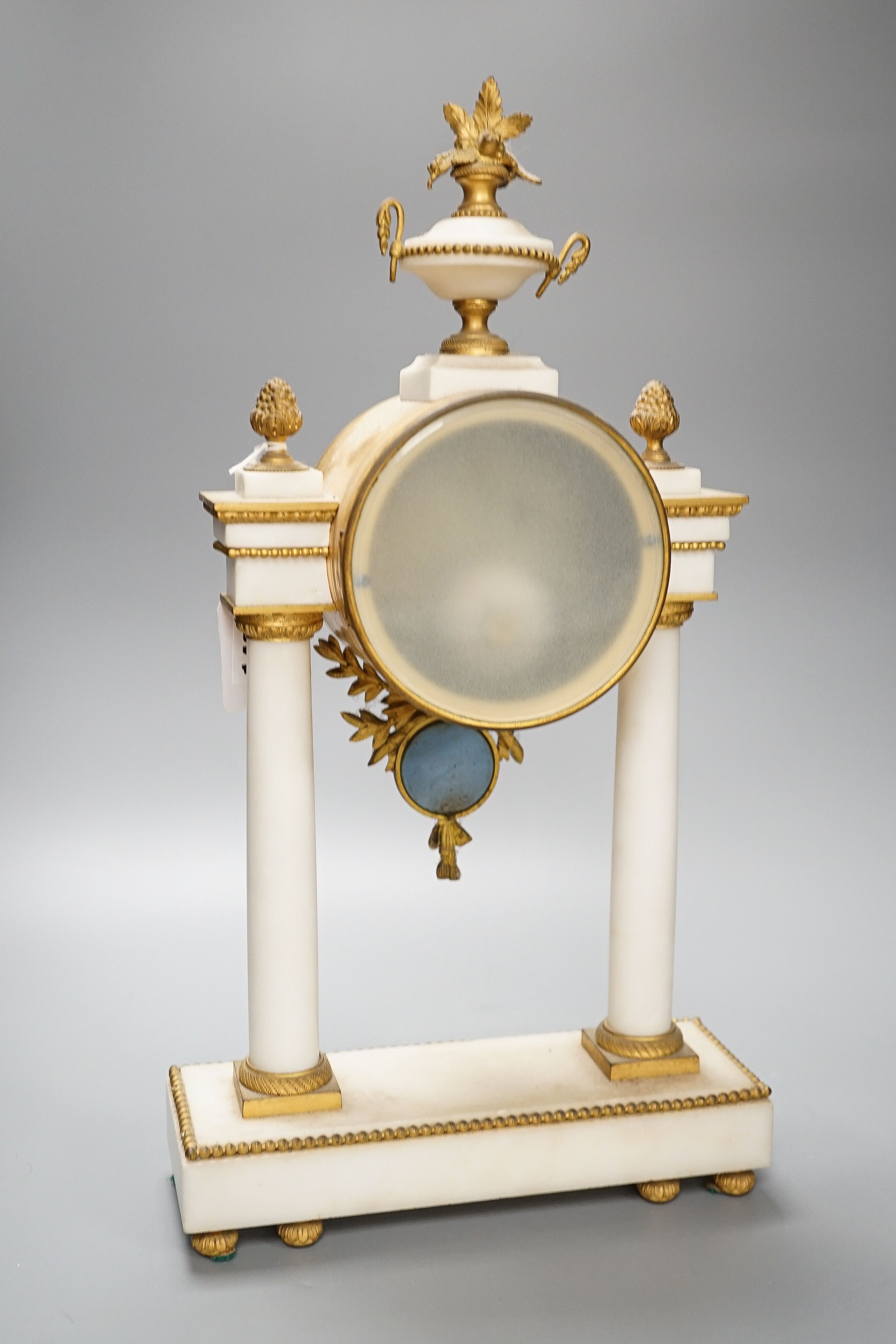 L. Leroy & Cie, Paris. A French ormolu mounted white marble portico clock width 24cm depth 8cm height 44cm high